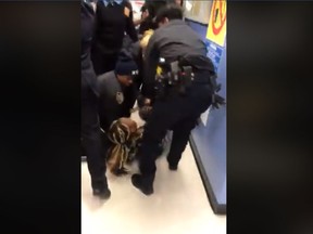Video, taken by a bystander and posted by Nyashia Ferguson on Facebook, captures the chaotic scene that unfolded last Friday as officers tried to remove mother Jazmine Headley from a crowded public benefits office in Brooklyn. (Facebook)
