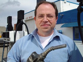 Brent Butt holds a gas nozzle on the set of the CTV comedy series Corner Gas in Roleau, Sask, in this undated handout photo.