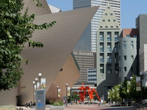 In this August 20, 2008 file photo, people walk past the Civic Center Cultural Complex which houses the Denver Art Museum, the Denver Public Library, the Colorado History Museum and the Byers-Evans House Museum in Denver, Colorado. (Doug Pensinger/Getty Images)