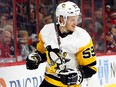 Pittsburgh Penguins' Jake Guentzel celebrates his goal against the Carolina Hurricanes during the second period of an NHL game Dec. 22, 2018, in Raleigh, N.C.