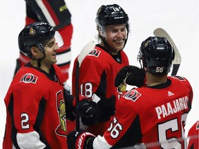 The Ottawa Senators' Ryan Dzingel celebrates his winning overtime goal with teammates Dylan DeMelo (2) and Magnus Paajarvi (56) following a game against the Pittsburgh Penguins in Ottawa on Saturday, Dec. 8, 2018.