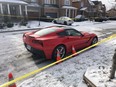 A red car remains cordoned off by police tape and evidence markers on Barnwood Dr., in the Bayview Ave. and Old Colony Rd. area of Richmond Hill on Dec. 25, 2018.