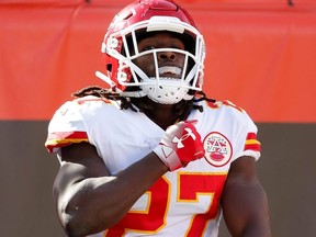 The Chiefs cut Kareem Hunt Friday night after video surfaced that showed the NFL's reigning rushing champion knocking over and kicking a woman in a Cleveland hotel in February.
