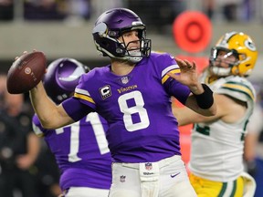 Vikings QB Kirk Cousins passes the ball against the Packers during NFL action at U.S. Bank Stadium in Minneapolis, Minn., on Nov. 25, 2018.