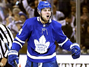 In this Oct. 3, 2018, file photo, Toronto Maple Leafs' Auston Matthews celebrates his first goal of the season.