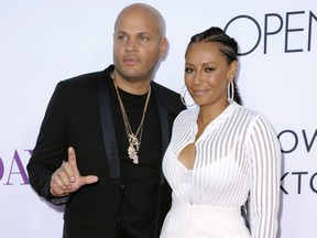 In this April 13, 2016 file photo, Stephen Belafonte, left, and his then-wife Melanie Brown arrive at the Los Angeles premiere of "Mother's Day."