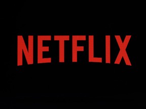 This July 17, 2017, file photo shows a Netflix logo on an iPhone in Philadelphia.