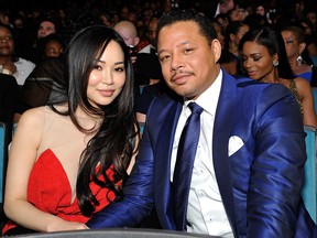 Terrence Howard (R) and Mira Christine Pak attend the 45th NAACP Image Awards presented by TV One at Pasadena Civic Auditorium on February 22, 2014 in Pasadena, Calif.