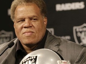 FILE - In this May 1, 2015, file photo, Oakland Raiders general manager Reggie McKenzie listens to questions at a news conference in Alameda, Calif. The Raiders have fired general manager Reggie McKenzie less than two years after he was named the NFL's executive of the year. A person familiar with the move says McKenzie was let go on Monday, Dec. 10, 2018, from the position he had held for almost seven seasons. The person spoke on condition of anonymity because the team has not made an announcement.(AP Photo/Jeff Chiu, File) ORG XMIT: NY184