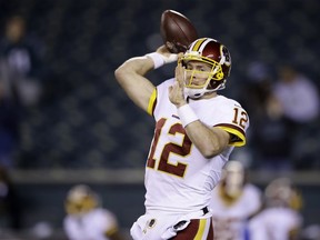 Washington Redskins' Colt McCoy warms up before an NFL football game against the Philadelphia Eagles, Monday, Dec. 3, 2018, in Philadelphia.