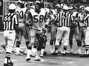In this Oct. 30, 1977, file photo, Los Angeles Rams linebacker Isiah Robertson complains about a call during an NFL game against the New Orleans Saints in New Orleans.
