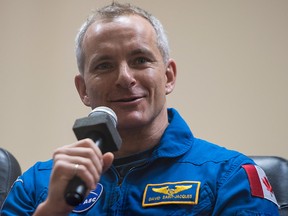Expedition 58 Flight Engineer David Saint-Jacques answers a question during a press conference, Sunday, Dec. 2, 2018 at the Cosmonaut Hotel in Baikonur, Kazakhstan.