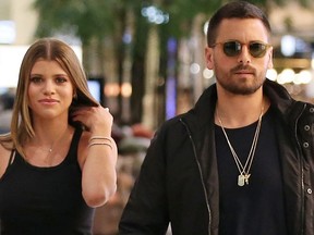 In this Nov. 1, 2018 file photo, Scott Disick and Sofia Richie ake a store appearance at Windsor Smith at Chadstone Shopping Centre on Melbourne, Australia.