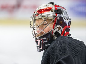 Craig Anderson waits for a drill to begin as the Ottawa Senators practice at Canadian Tire Centre on Monday.