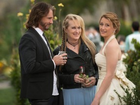 This photo provided by courtesy of Sony Pictures shows, Rick Springfield, from left, as Greg, Meryl Streep, as Ricki, and Mamie Gummer as Julie, in TriStar Pictures' "Ricki and the Flash."