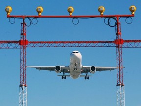 An Air Canada jet prepares to land at Pearson International Airport in Toronto, Thursday September 30, 2004. A federal report says there has been no surge of extremist travellers returning to Canada, despite the overseas setbacks suffered by militant forces in Iraq and Syria.