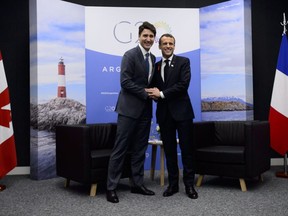 Prime Minister Justin Trudeau meets with President of France Emmanuel Macron at the G-20 Summit in Buenos Aires, Argentina on Saturday, Dec. 1, 2018.