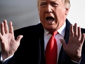 US President Donald Trump speaks to reporters while walking to Marine One on the South Lawn of the White House November 29, 2018 in Washington, DC. - Trump said ex-lawyer Michael Cohen was 'lying' over a guilty plea for reduced sentence earlier today. (Photo by Brendan Smialowski / AFP) (Photo credit should read BRENDAN SMIALOWSKI/AFP/Getty Images)