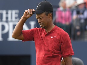 Tiger Woods of the United States acknowledges the crowd on the 18th green during the final round of the 147th Open Championship at Carnoustie Golf Club on July 22, 2018 in Carnoustie, Scotland.
