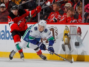 Despite being in Vancouver's top four for offensive production, Nikolay Goldobin, right, was scratched from the Canucks' lineup on Wednesday in Ottawa.