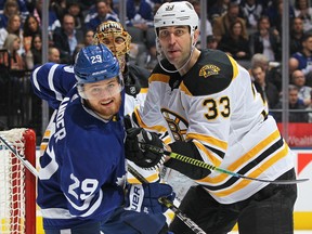 Zdeno Chara of the Boston Bruins, right, battles against William Nylander of the Toronto Maple Leafs during an NHL game at Scotiabank Arena on Jan. 12, 2019 in Toronto. (Claus Andersen/Getty Images)