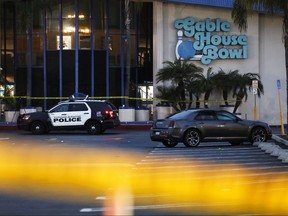 Police investigate the scene of a shooting that left three men dead and four injured at Gable House Bowl on Jan. 5, 2019 in Torrance, Calif.  (Mario Tama/Getty Images)