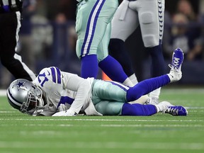 Allen Hurns of the Dallas Cowboys lays on the field after being injured in the first quarter against the Seattle Seahawks during the Wild Card Round at AT&T Stadium on Jan. 5, 2019 in Arlington, Texas. (Tom Pennington/Getty Images)