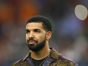 In this file photo taken on July 20, 2017 Rapper Drake looks on prior to the International Champions Cup soccer match between Manchester City against Manchester United at NRG Stadium in Houston, Texas.