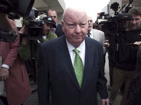 Sen. Mike Duffy leaves the courthouse after being acquitted on all charges Thursday, April 21, 2016 in Ottawa.