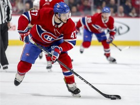 Canadiens' Kenny Agostino carries the puck past centre ice during first period of National Hockey League game against the Boston Bruins in Montreal Monday Dec. 17, 2018.