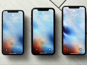 This Oct. 22, 2018, file photo shows the iPhone XS, from left, iPhone XR, and the iPhone XS Max in New York.  (AP Photo/Richard Drew, File)