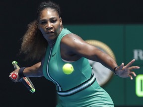 United States' Serena Williams prepares to hit a forehand return to Germany's Tatjana Maria during their first round match at the Australian Open tennis championships in Melbourne, Australia, Tuesday, Jan. 15, 2019. (AP Photo/Kin Cheung)