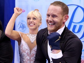 Caydee Denney and John Coughlin celebrate in the kiss and cry after skating in the free dance during the Prudential U.S. Figure Skating Championships at TD Garden on Jan. 11, 2014 in Boston, Mass. (Matthew Stockman/Getty Images)