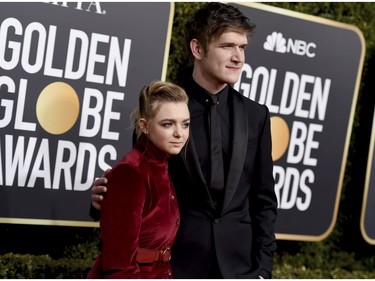 Elsie Fisher, left, and Bo Burnham arrive at the 76th annual Golden Globe Awards at the Beverly Hilton Hotel on Sunday, Jan. 6, 2019, in Beverly Hills, Calif.