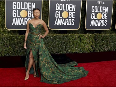 Jeannie Mai arrives at the 76th annual Golden Globe Awards at the Beverly Hilton Hotel on Sunday, Jan. 6, 2019, in Beverly Hills, Calif.