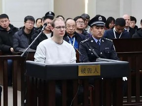 This photograph taken and released by the Intermediate Peoples' Court of Dalian on Jan. 14, 2019 shows Canadian Robert Lloyd Schellenberg during his retrial on drug trafficking charges in the court in Dalian in China's northeast Liaoning province.