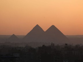 A general view shows Egypt's Giza Pyramids on the outskirts of Cairo during sunset on January 28, 2019.