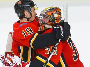 Calgary Flames Matthew Tkachuk and David Rittich celebrate after defeating the Colorado Avalanche during NHL hockey at the Scotiabank Saddledome in Calgary on Wednesday.