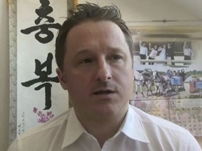 In this image made from video taken on March 2, 2017, Michael Spavor, director of Paektu Cultural Exchange, talks during a Skype interview in Yangi, China.