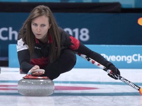 Canada's skip Rachel Homan delivers a shot as they face Switzerland during preliminary round in women's curling at the Pyeongchang 2018 Olympic Winter Games in Gangneung, South Korea, on Sunday, February 18, 2018.