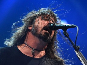 Dave Grohl, vocalist and guitarist of the Foo Fighters, performs to a packed house at the Saddledome in Calgary on Tuesday, October 23, 2018.