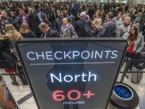 Security lines at Hartsfield-Jackson International Airport in Atlanta stretch more than an hour long amid the partial federal shutdown Monday morning, Jan. 14, 2019.