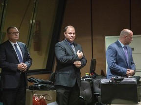 In this Oct. 30, 2018 file photo, from left, former Detective David March, Chicago Police Officer Thomas Gaffney and former officer Joseph Walsh appear at a pre-trial hearing in Chicago.