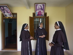 In this Sunday, Nov. 4, 2018, photo, Sister Josephine Villoonnickal, left, sister Alphy Pallasseril, center, and Sister Anupama Kelamangalathu, who have supported the accusation of rape against Bishop Franco Mulakkal talk at St. Francis Mission Home, in Kuravilangad in southern Indian state of Kerala.
