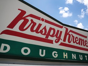 A Krispy Kreme Donuts sign is seen outside of a store on May 9, 2016 in Miami, Florida. (Joe Raedle/Getty Images)