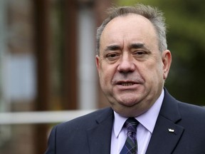 In this Thursday, Sept. 18, 2014 file photo, Scotland First Minister Alex Salmond poses for photographs in Turriff, Scotland.