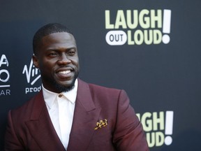 In this Aug. 3, 2017 file photo, Kevin Hart poses at Kevin Hart's "Laugh Out Loud" new streaming video network launch event at the Goldstein Residence in Beverly Hills, Calif.