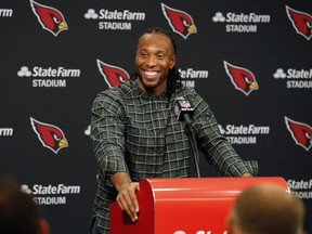 In this Dec. 23, 2018, file photo, Arizona Cardinals wide receiver Larry Fitzgerald speaks after a game against the Los Angeles Rams, in Glendale, Ariz.