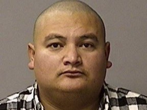 This undated booking file photo provided by the Stanislaus County Sheriff's Department shows Gustavo Perez Arriaga.