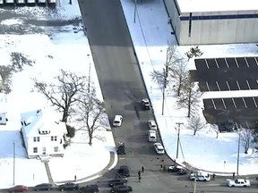 In this image provided by WPVI-TV/6ABC, police respond to a report of an active shooter at a United Parcel Service facility in Logan Township, N.J., Monday, Jan. 14, 2019. (WPVI-TV/6ABC via AP)